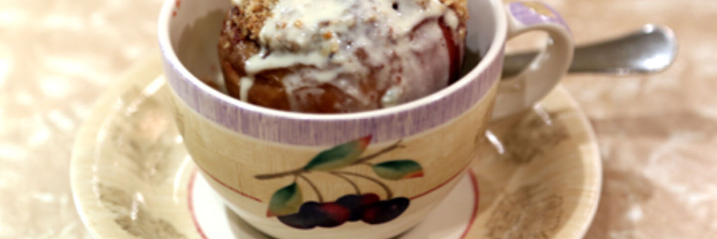 Bakes apples filled with damson jam & topped with crumble