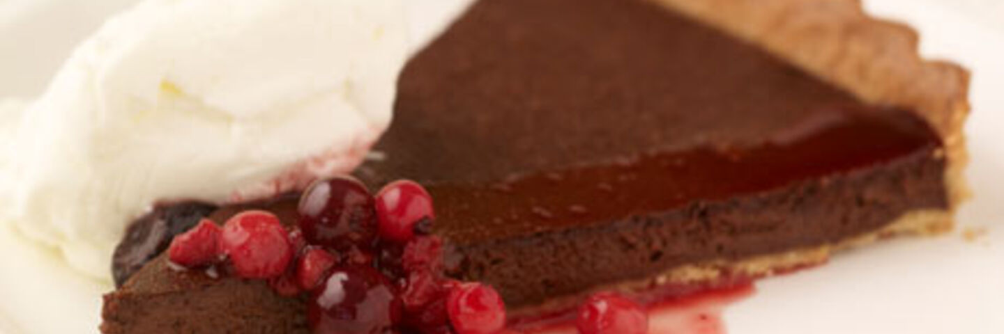 Chocolate Tartlet with Boozy Berries