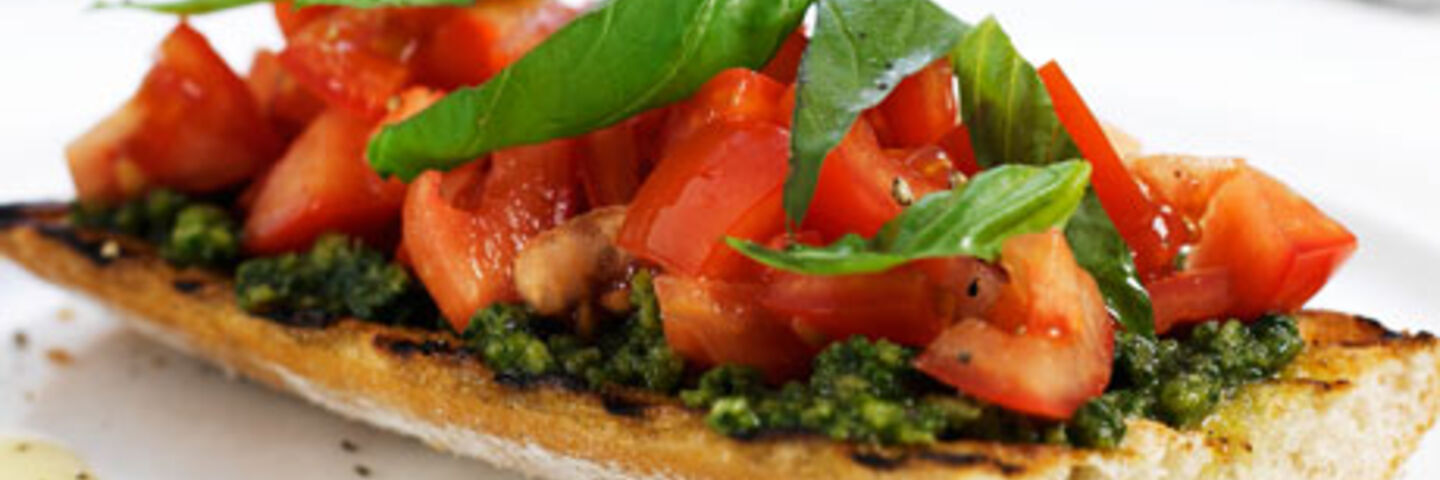 Pesto Infused Tomato Bruschetta