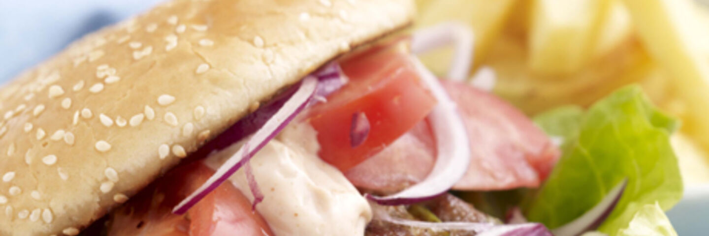 Beef Burger in a Bun, Salad and Homemade Oven Chips