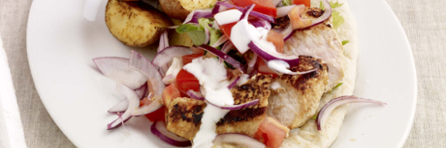 Chilli, Lime & Yogurt Marinated Chicken with Pitta Bread & Spicy Wedges