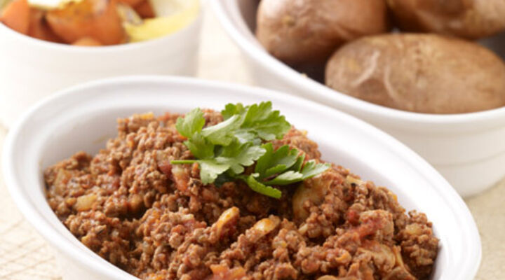 Baked Potatoes with Chilli Beef and Oven Roasted Carrots and Onions