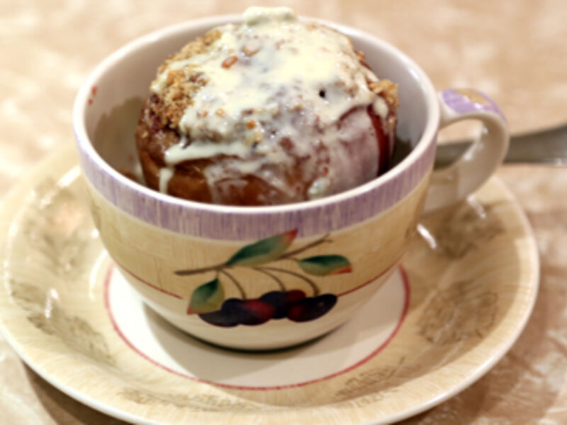 Bakes apples filled with damson jam & topped with crumble